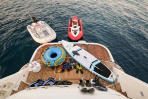 swimming platform behind the yacht with water sports - elite pearl charter