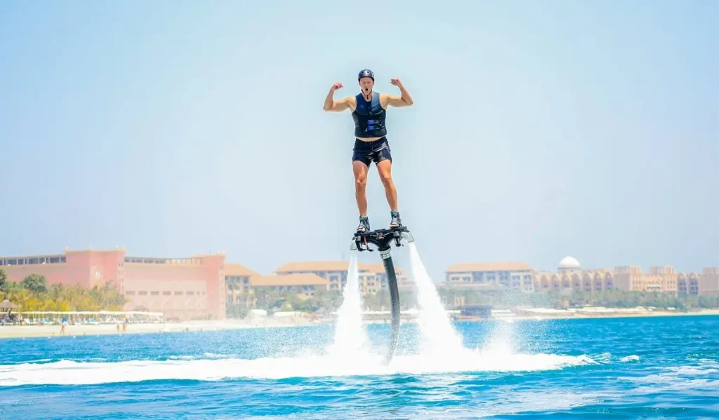 elite pearl charter - a person on a fly board in Dubai waters.