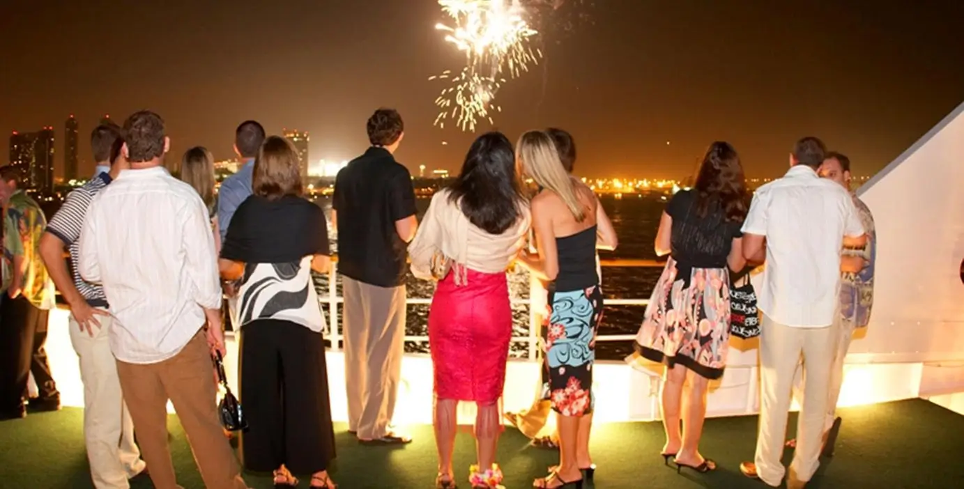 elite pearl charter - people celebrate on a yacht during the new year. nightlife in dubai