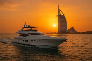 A view from one of the best yacht rental companies in Dubai, showing a luxury yacht near the Burj Al Arab.