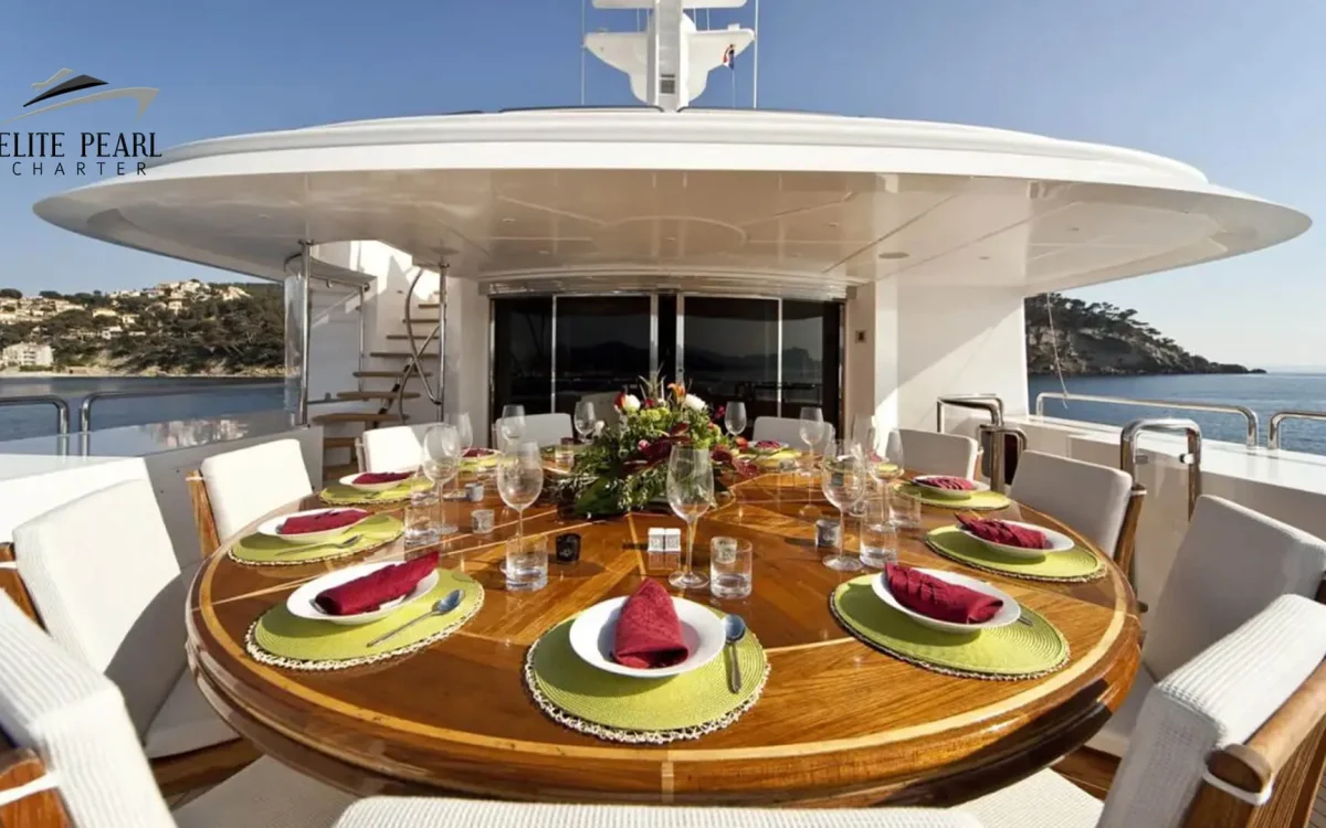 elite pearl charter - Elite Mega 164 Ft w/ jacuzzi dining table at the back. The Art of Yacht Proposal: Planning the Perfect Engagement on a Dubai Yacht image blog.